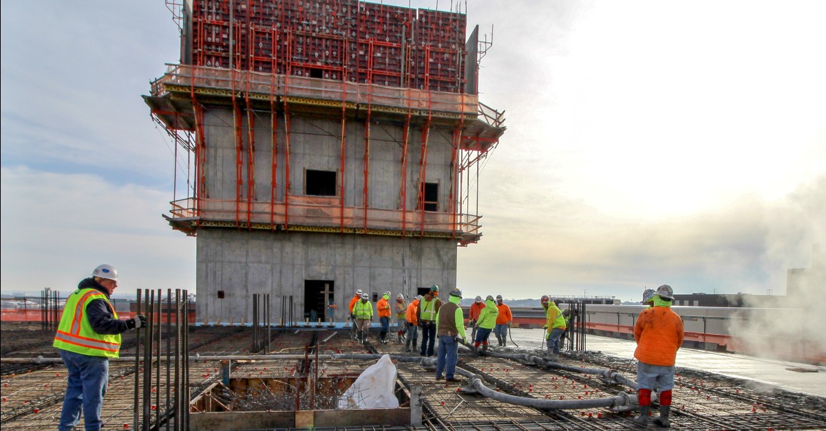 Construction crews pour concrete that forms every level of the Research Tower.